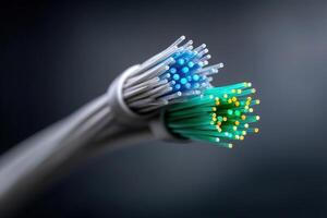 Fiber optic patch cords emit colorful light in a dark setting photo