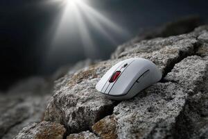 Computer mouse embedded in stone shows unique merging of technology and nature photo