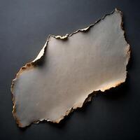 Abstract Torn Paper with Rough Edges on Dark Background Texture photo