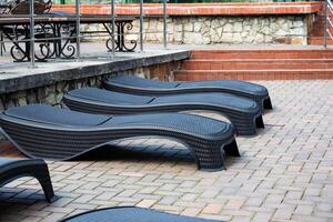 empty pool on a brick patio. photo