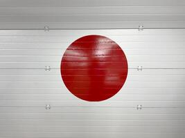 Creative integration of the Japanese flag into garage door design, symbolizing national identity, cultural pride and the influence of Japanese aesthetics in unexpected urban spaces photo