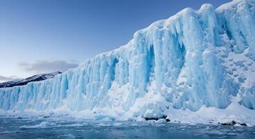 Ice wall. Tall frozen ice cliff with detailed surface textures, great for 3D modeling, frozen world concepts, or winter-themed visual effects. photo