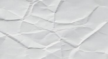 Crumpled white paper texture as a background image, perfect for minimalistic designs, note-style content, or stationary mockups. photo