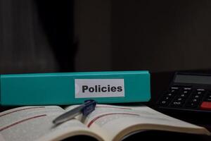 folders with the label Policies. Business management concept photo