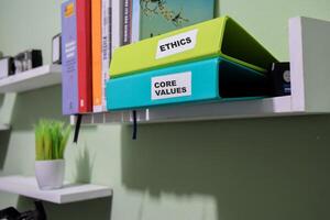 folders with the label Ethis and Core values, Business management concept photo