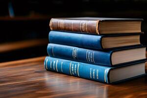Stack of old books resting on wooden table in library setting photo