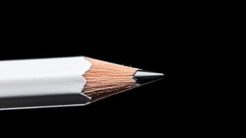 A close up of a pencil on a black background photo