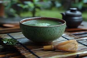 Traditional Japanese Matcha Tea in Rustic Ceramic Bowl on Bamboo Mat photo