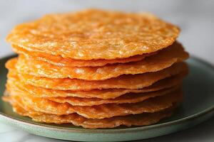 Stack of Crispy Rice Wafers on a Plate - Asian Snack Concept for Culinary Delight and Texture photo