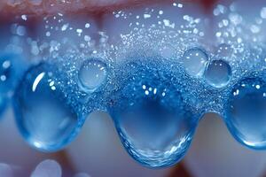 Macro View of Water Droplets and Ice Crystals in Cool Blue Tones photo