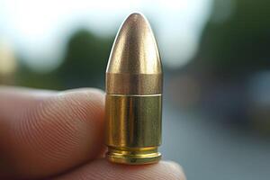 Close-Up View of a Single Bullet for Ammunition and Firearm Safety Themes photo