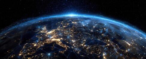 The illuminated globe showcasing interconnected cities and networks at night. photo