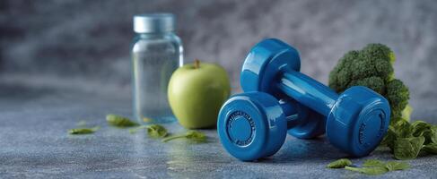 The vibrant blue dumbbells and fresh produce on a stylish countertop. photo