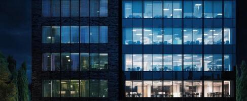 The modern office building illuminating the urban night skyline. photo