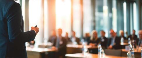 The professional delivering an engaging presentation to a focused audience at a conference. photo