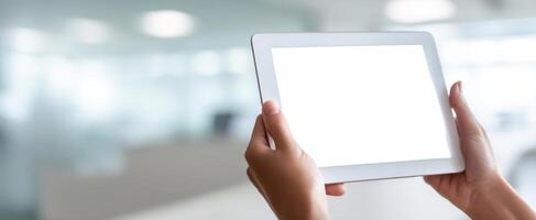 The minimalist tablet showcasing an empty screen in a modern office setting. photo
