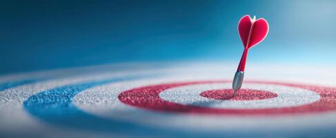 The heart-shaped dart hitting the target in a creative love concept. photo