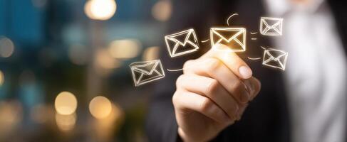 The hand highlighting digital emails for effective communication and networking. photo