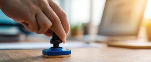 The stamping process in a professional office setting with focused light. photo