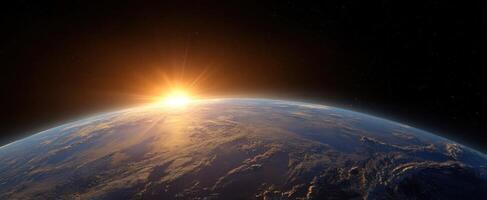 The breathtaking sunrise illuminating Earth from the vastness of space. photo