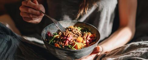The delicious salad served in a rustic bowl, highlighting fresh ingredients. photo
