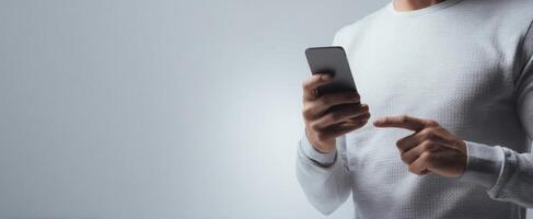 The man interacting with a smartphone in a modern and stylish manner. photo