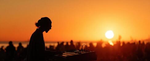 The musician creating enchanting sounds against a stunning sunset backdrop. photo