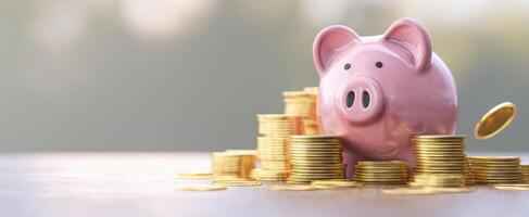 The piggy bank surrounded by stacks of coins symbolizing savings and wealth. photo
