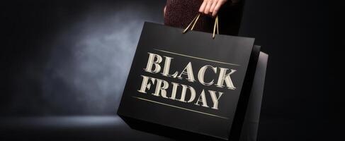 The Stylish Shopper Holding a Black Friday Bag in a Dramatic Setting photo