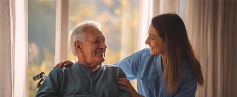 The caregiver providing warmth and connection to an elderly man in a serene indoor setting. photo