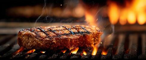 The sizzling steak being grilled to perfection over an open flame. photo