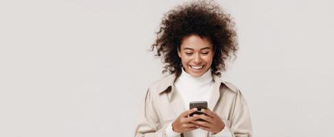 The smiling woman enjoying her smartphone in a stylish setting. photo