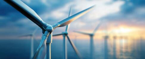 The modern wind turbine harnessing energy from the ocean breeze. photo