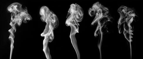 The captivating dance of smoke forming abstract shapes on a dark background. photo