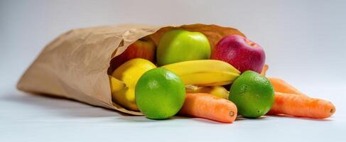 The colorful assortment of fruits and vegetables spilling from a brown paper bag. photo
