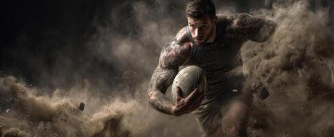The determined athlete charging through dust while carrying a rugby ball. photo