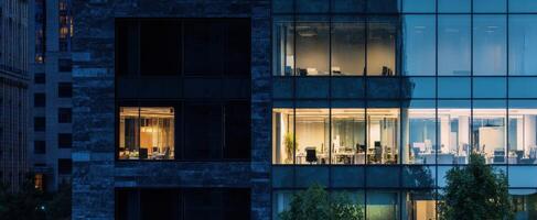 The elegant office buildings glowing in twilight with modern architecture and vibrant lights. photo