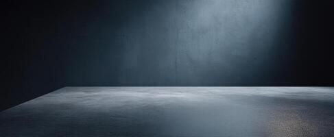 The dramatic empty space with a spotlight on a reflective surface. photo