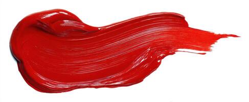 The vibrant red paint stroke evoking creativity and artistic expression. photo
