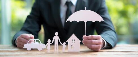 The Umbrella Protecting Family, Home, and Vehicle in Business Context photo
