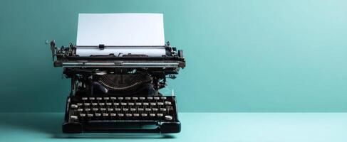The vintage typewriter highlighting creativity and nostalgia against a soothing teal background. photo