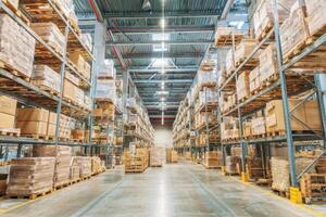 A Massive and Organized Warehouse Full of Stocked Shelves for Storage Shipping photo