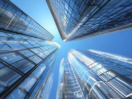 Modern Financial District Skyscrapers Reflecting Blue Sky in an Upward Perspective View photo