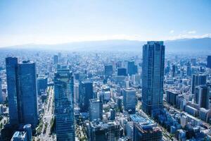 An Expansive View of the City Skyscrapers Reaching Towards the Clear Sky photo