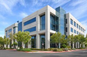 Modern Office Building with Glass Windows and Blue Sky Office Environment photo