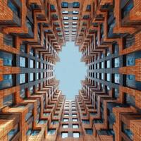 The sky is looking up at a building in a city photo