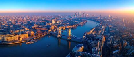 London Panoramic Cityscape over River at Sunset or Sunrise photo