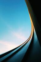 Abstract Geometric Architecture with Sky Above the Metallic Surface photo