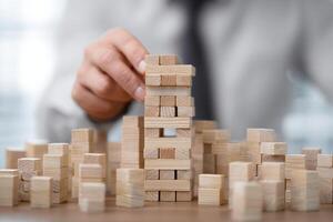 Building a Tower of Wooden Blocks Requires Planning Strategy and Precise Skills photo