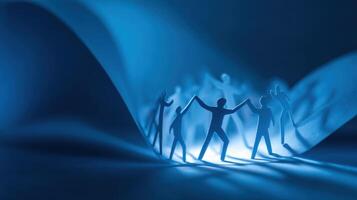 Human Connection Silhouette Holding Hands in the Darkness and in the Light photo